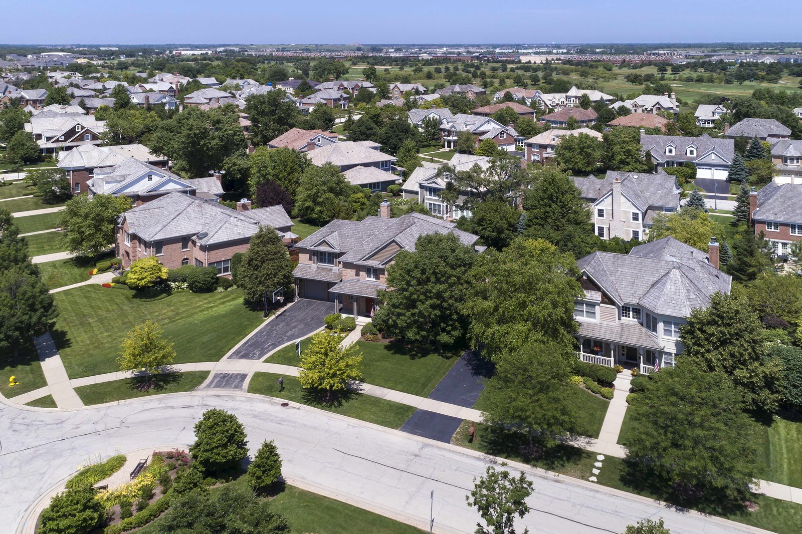 Finished architectural shingle roof on a single-family home